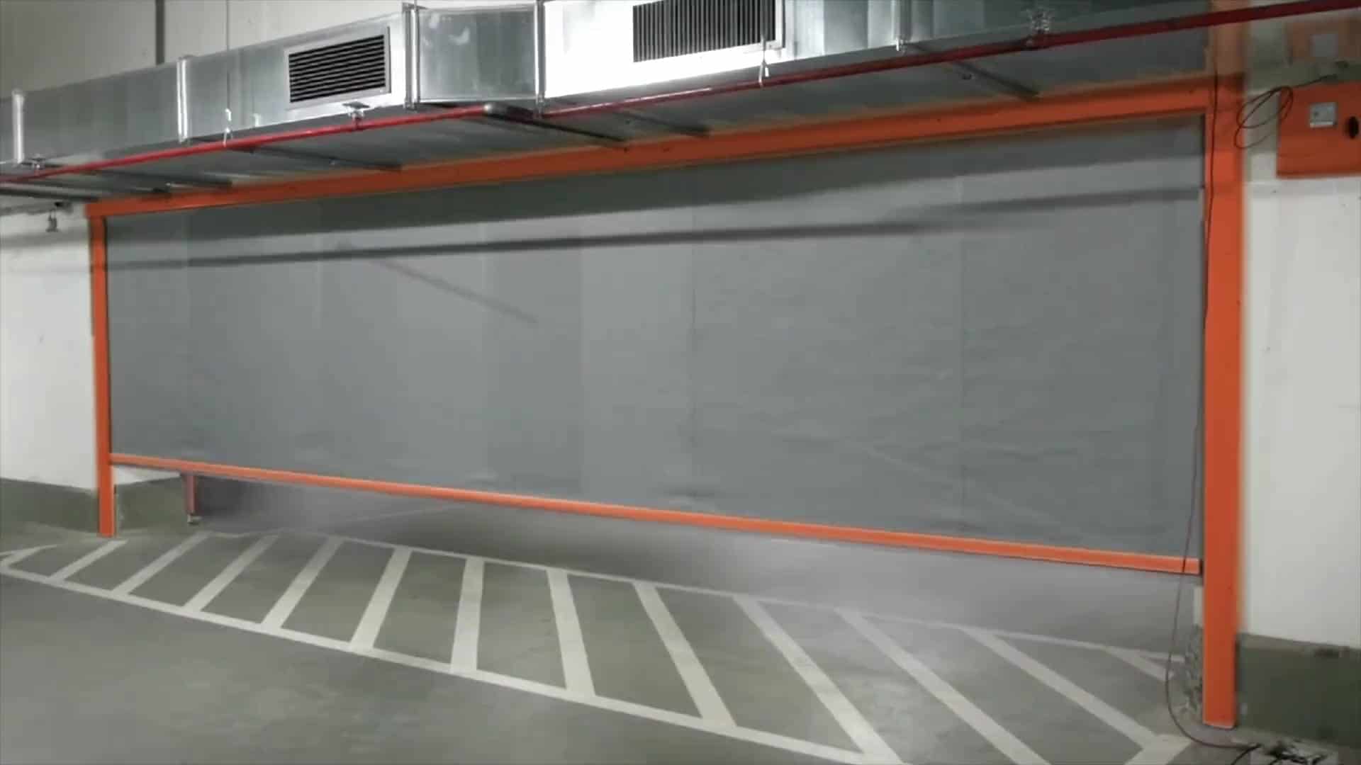 B&Ouml;LDT fire curtain lowered across a car park opening